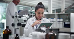 Scientist, woman and research at laboratory with tablet, test and review for results in pharmaceutical study. Person, app and clinical trial for medicine, perspective and medical solution by computer