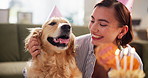 Birthday, cake or cuddle with dog and woman in living room of apartment together for celebration. Love, party and smile of pet owner with labrador in apartment for bonding, friendship or milestone