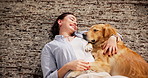 Above, dog and woman on floor, embrace and bonding together with weekend break. Home, pet and happy person on carpet, relaxing and comfortable with service animal, smile and chilling with support