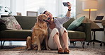 Woman, dog and selfie on floor, home and happy with hug, loyalty and care with post on social media. Girl, animal and pet labrador with profile picture, photography and excited for memory in lounge