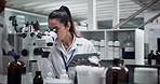 Microscope, woman and scientist on tablet for development, research and chemistry experiment. Medical, science and worker on technology for pharma exam, microbiology and check test results in lab
