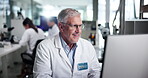Science, mature or face of happy man on computer for test research, development or innovation. Medical, smile or confident scientist with biotechnology for pharma, microbiology and experiment in lab