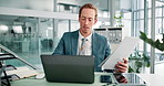 Office, businessman and accountant with laptop for document, financial investment and information. Career, male person and auditor with digital for finance research, review revenue and typing report