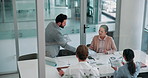 Meeting, documents and above of business people with report for feedback, project and finance review. Professional, corporate and men and women with paperwork for discussion, teamwork and planning