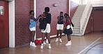 Sports player, basketball and friends with greeting, smile or fist bump for welcome. African girls, team stretching and women at university for fitness, handshake or talking while walking to practice