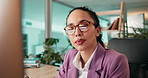 Computer, reading and research with business woman at desk in office for financial reporting. Finance, information and review with accounting employee in workplace for investment banking online