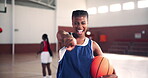 Pointing, face and sports with black woman on basketball court for competition choice, training and fitness. Workout, athlete and option with person laughing for challenge, exercise and wellness
