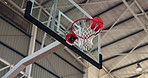 Basketball, hoop and score point with net, rim and sports training for competition, target or shot for game. Equipment, contest or conference tournament with swish, shooting and court at gymnasium 