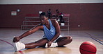 Athlete, black woman and warm up legs on court for start of game, match and fitness. Basketball player, stretching and ready of sport competition, training preparation and workout of practice session