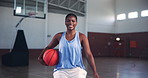 Happy, basketball and face of black woman on court excited for competition, game or challenge. Fitness, smile and portrait of African athlete with ball for sports match in tournament in gym.