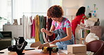 Woman, fashion and packing boxes at workshop for necklace, smile or distribution for shipping order. Person, logistics and cardboard container for product, jewelry and sales at online shopping job