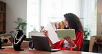 Woman, tablet and designer with paperwork in workshop, review and check results with sales stats. Person, digital touchscreen and app for online fashion store, finance report or distribution schedule
