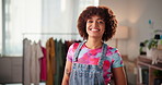 Girl, face and designer at small business for fashion, boutique or trendy style at store. Portrait, entrepreneur or happy woman with creative clothes, confidence or smile for custom design at shop
