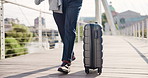 Suitcase, travel and businessman on bridge in city for global journey for finance career. Luggage, walking and professional male financial executive with baggage for work trip outdoor in urban town.