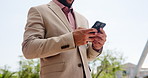 Cellphone, hands and businessman in city for email, communication or contact with investment client. Phone, closeup and financial manager typing for social networking online with technology in town.