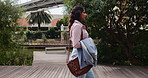 Walking, travel and business woman in city for commute, professional and property manager. Real estate developer, morning and downtown with person outdoor for opportunity, moving and confidence
