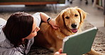 Relax, tablet and woman with dog in living room of home for bonding, reading or streaming. Love, smile or wellness with animal and happy pet owner on floor together for companionship or loyalty