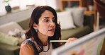 Woman, palette and brush with canvas in home studio with creative process, color and inspiration with project. Person, painter and brush with stroke, talent and design in living room at apartment