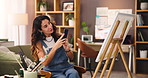 Painter, phone and photography of art in studio for online portfolio, small business and showcase talent on website. Artist, mature woman and picture of canvas in home for social media and marketing