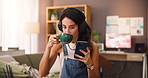 Coffee, artist and woman with phone for music or listening to inspiration podcast. Drink, headphones and painter on mobile for creative hobby, audio and streaming video for art design in home studio