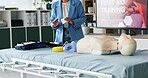 Hands, woman and teaching for first aid training of bandage safety, demonstration lesson and workshop. Person, explain and gauze of wound care, medical emergency and learning procedure of life saving