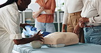 Ventilator, cpr and people with dummy for class, tutorial and lesson for first aid. Healthcare, safety and men and women with respiratory mask for paramedic course, learning and medical demonstration