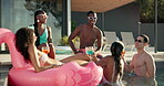 Happy, talking and friends in swimming pool to party together for holiday, alcohol or vacation to relax. Drinks, fun or group of people in water at hotel, lodge or resort for summer outdoor weekend