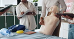 People, hands or mannequin for first aid lesson for rescue safety, demonstration class or education. Body dummy, pointing or paramedic in presentation for medical emergency, learning procedure or cpr