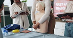 People, hands or dummy for first aid lesson for rescue safety, demonstration class or education. Body mannequin, cpr or paramedic in presentation for medical emergency, learning procedure or group