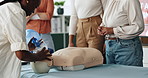 People, hands or mask for first aid dummy for rescue safety, demonstration lesson or education. Paramedic, healthcare or woman in training for medical emergency, learning procedure or life saving