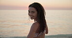Beach, woman and face with happiness on vacation, weekend holiday and confidence on summer break. Outdoor, sunset and female person with running in portrait, travel and peace in California ocean