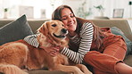 Hug, happy and woman with dog on sofa for bonding, relaxing and playing together in living room. Pets, best friend and person with Golden Retriever on couch for affection, petting and love in home