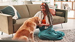 Happy, treat and woman with dog at home for pet training, animal adoption and canine loyalty. Love, bonding and golden retriever with person in living room of house for puppy food, relax and care