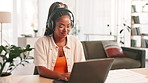 Headphones, typing and woman on laptop for remote work, accounting and financial review. Music, computer and African freelancer in home office for audit, bookkeeping and reading email for budget
