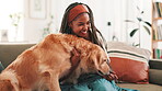 Smile, food and woman with dog at home for pet training, animal adoption and canine loyalty. Love, bonding and golden retriever with person in living room of house for puppy treat, relax and care