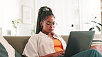Serious, employee and woman with laptop, home and creative for web design in living room or online. Remote work, graphic designer and black person with tech for layout of project, typing and planning