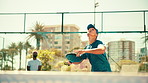 Man, racket and padel with serve, outdoor and sports with training for competition with low angle in summer. Person, athlete and partner with equipment, gear and fitness for challenge with contest