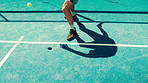Sports, tennis court and feet of person with ball for game, match and competition outdoors. Fitness, padel and legs of athlete for training, exercise and workout for tournament, challenge or practice