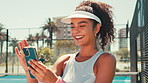 Sports, happy and woman with phone on tennis court for social media, online chatting and internet. Athlete, fitness and person on smartphone typing after training, exercise and workout for game