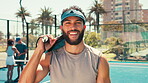 Padel tennis, face and smile with man on court for competition, training and performance. Game, sports workout and fitness club with person in match for athlete, exercise and racket tournament