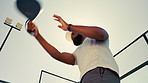 Below, man and serving for sports match of padel game, cardio exercise and club competition. Person, racket and for fitness training, practice skills and performance for challenge of tournament event