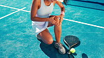 Woman, tennis and player with knee pain injury for match accident, muscle sprain or massage tension. Padel sport, athlete and joint inflammation on court for fitness training, bone fracture or strain