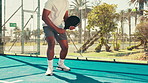 Hands, man and racket for sports match of padel game, cardio exercise and club competition. African, person and serve for fitness training, practice skills and performance for challenge of tournament