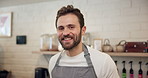 Face, happy man and barista in small business in cafe startup for hospitality, customer service and pride. Portrait, smile and professional worker in coffee shop, waiter and confident server in Italy