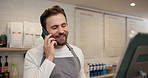 Man, waiter and talking with phone call at cafe for online order, customer reviews and confirm takeaway. Person, discussion and tablet for inventory, stock check and menu update for ecommerce payment