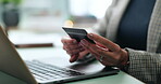 Closeup, hands and information with laptop for credit card, online shopping and transaction for payment. Office, person and digital with debit for typing password, ecommerce and check for banking web