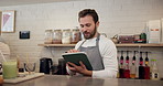 Man, waiter and scroll on tablet at cafe for online order, customer reviews and inventory management. People, talk and digital with stock checklist, menu update and confirm takeaway for ecommerce web