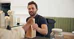 Restaurant, delivery man and waiter giving food for online order, receipt and collection. Customer service, hospitality and server with person for takeaway, service and parcel for ecommerce in cafe