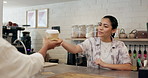 Smile, coffee and barista with customer in cafeteria with hospitality, service or helping in morning. POS, women and waitress with client for latte, cappuccino or caffeine in restaurant for startup.