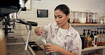 Woman, barista and making coffee in cafe, retail and customer service in small business or espresso. Startup, waitress and person with cup for cappuccino, server and employee with order in restaurant